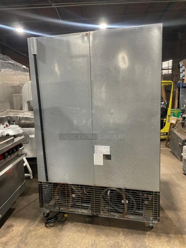 Kool-It commercial black electric double glass door merchandiser freezer, model 163-LX-46FB, on casters, in used condition.