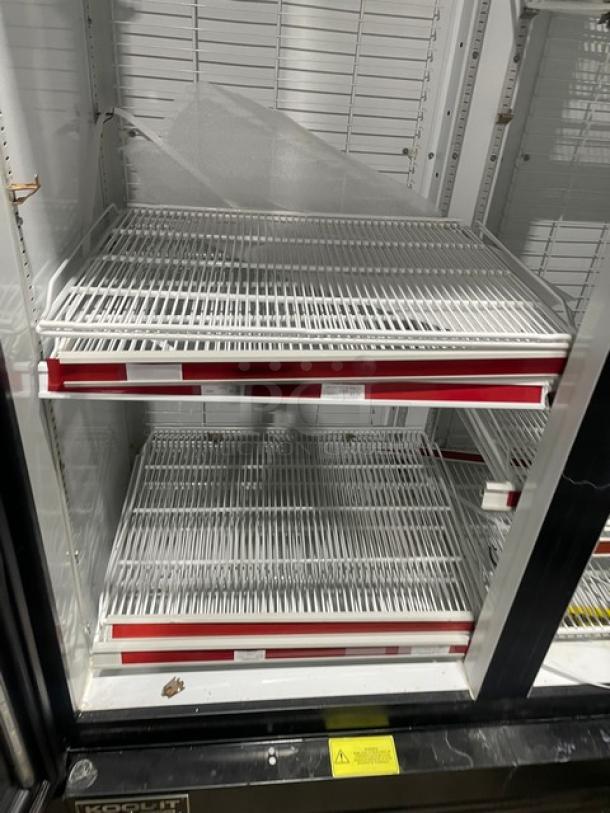 Kool-It double glass door freezer, Model 163LX46FB, with poly-coated wire racks, 115V, on casters, commercial use.