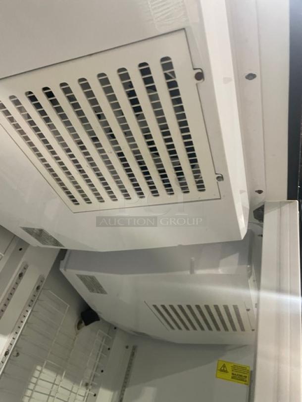 Kool-It Commercial Freezer, Model 163LX46FB, double glass door, poly-coated wire racks, on casters, 115V 1 Phase.