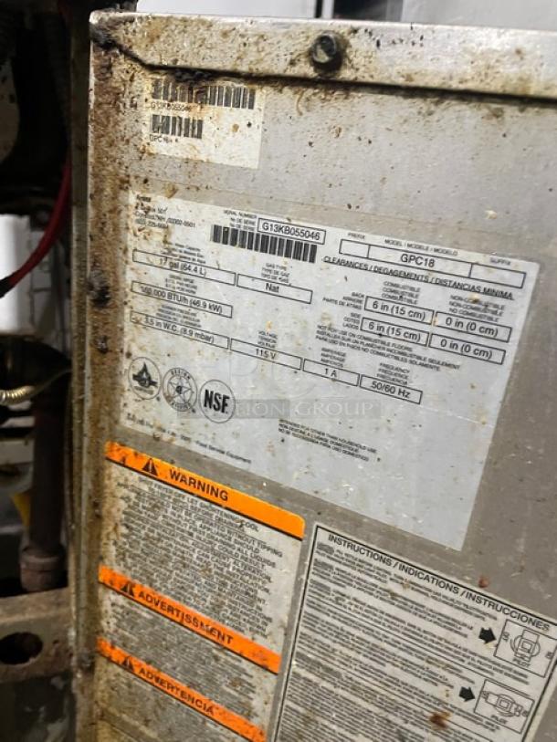 Anets GPC18 commercial stainless steel natural gas pasta cooker with back splash, model and serial number tags visible. Condition shows wear.