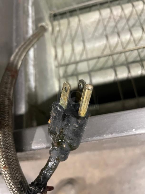 Anets GPC18 commercial stainless steel pasta cooker plug and basket. Natural gas powered, with backsplash.