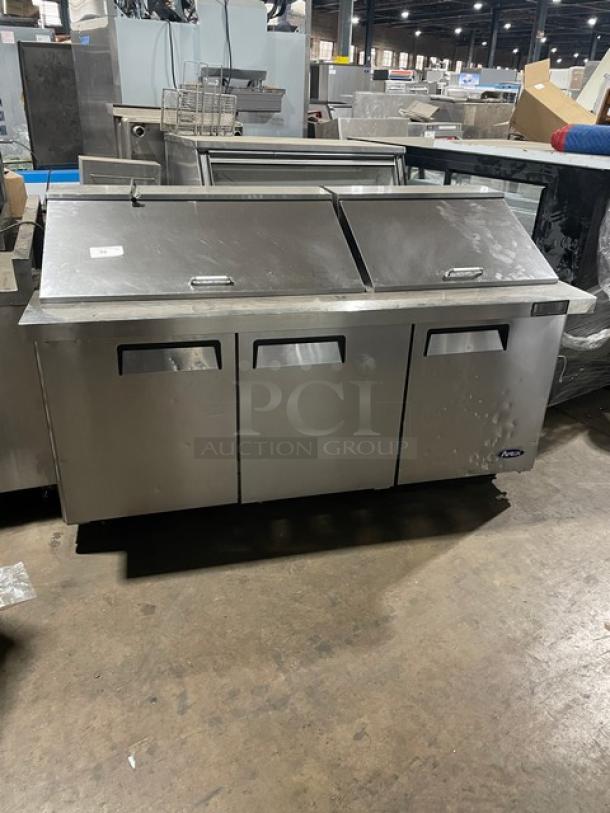 Atosa Mega Top Series 3-door stainless steel refrigerated prep table, model MSF8308GR, on casters, in good condition.