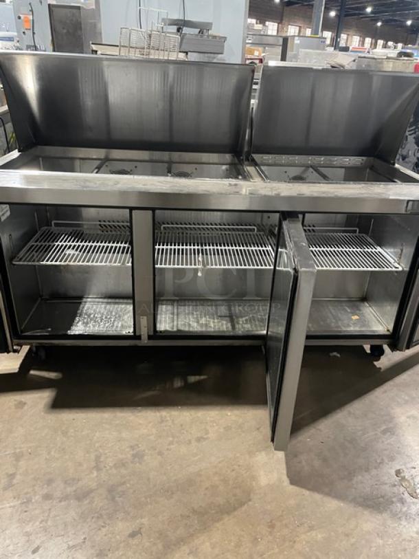 Atosa Mega Top 3-Door Sandwich/Salad Prep Table, Model MSF8308GR, stainless steel, on casters, good condition.