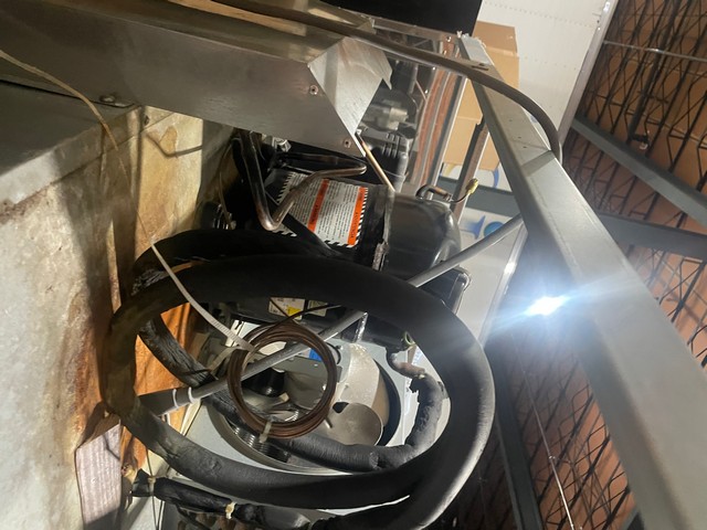 Clean condenser coils on commercial refrigeration