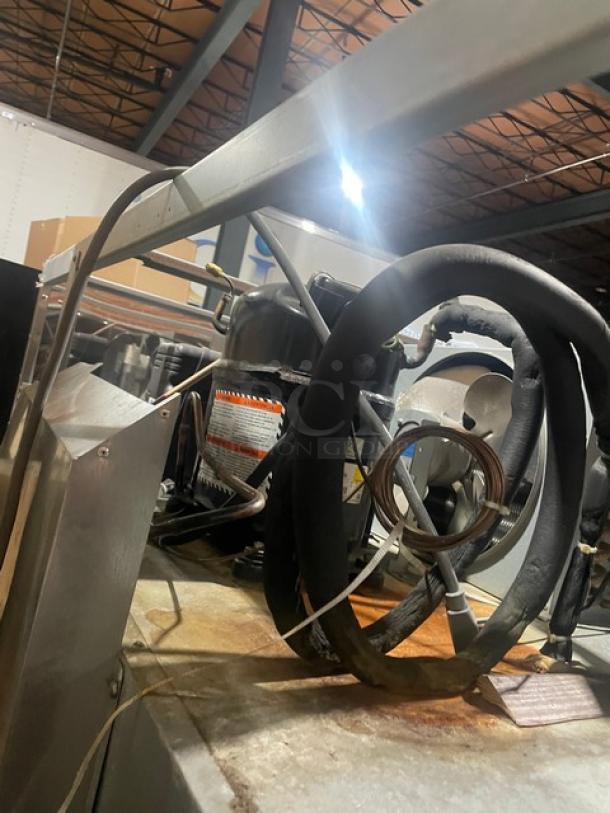 Turbo Air M3 Series commercial freezer interior view, model M3F47-2, showing components and wiring, Energy Star certified.