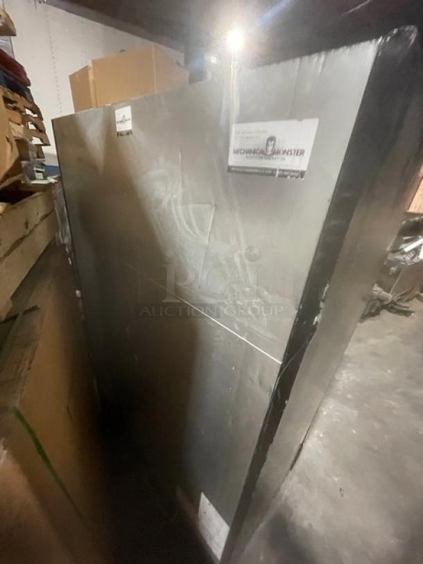 Turbo Air TGF47SDBN commercial black electric 2-door freezer with glass doors and poly-coated racks, model SN: H2FS47BD7003.