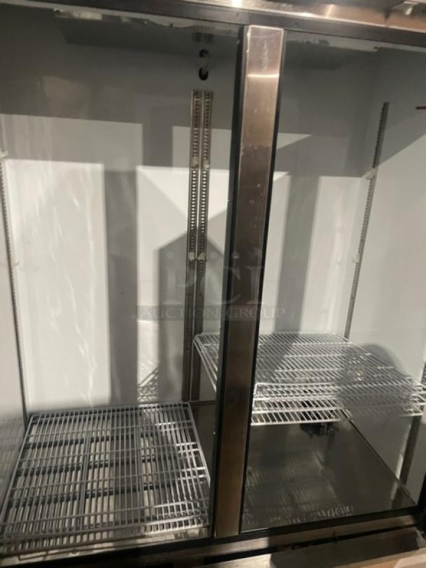 Beverage-Air KF48-1AS stainless steel 2-door reach-in freezer with poly-coated wire racks, electric-powered, 115V.