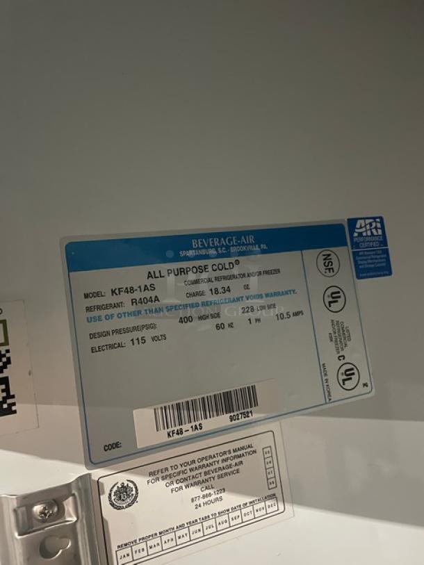 Beverage-Air KF48-1AS commercial freezer tag, detailing model, refrigerant type R404A, 115V, 1-phase electric specifications.