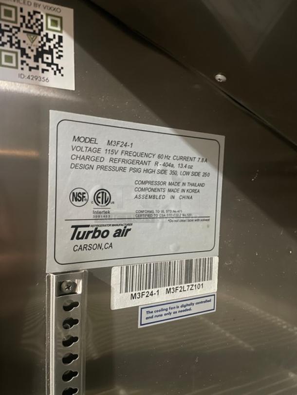 Turbo Air M3F24-1 commercial freezer, stainless steel, Energy Star certified, with poly-coated racks. Model label visible.