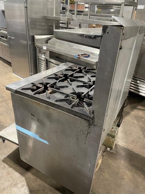 Jade natural gas 6-burner stainless steel range with convection oven, raised back splash, salamander shelf, on casters.