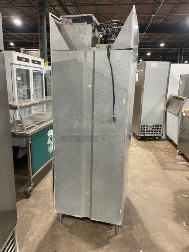 Continental DL1FE one-door reach-in freezer, stainless steel, 115V, 1 phase, on legs, visible wear, serial 13548061.