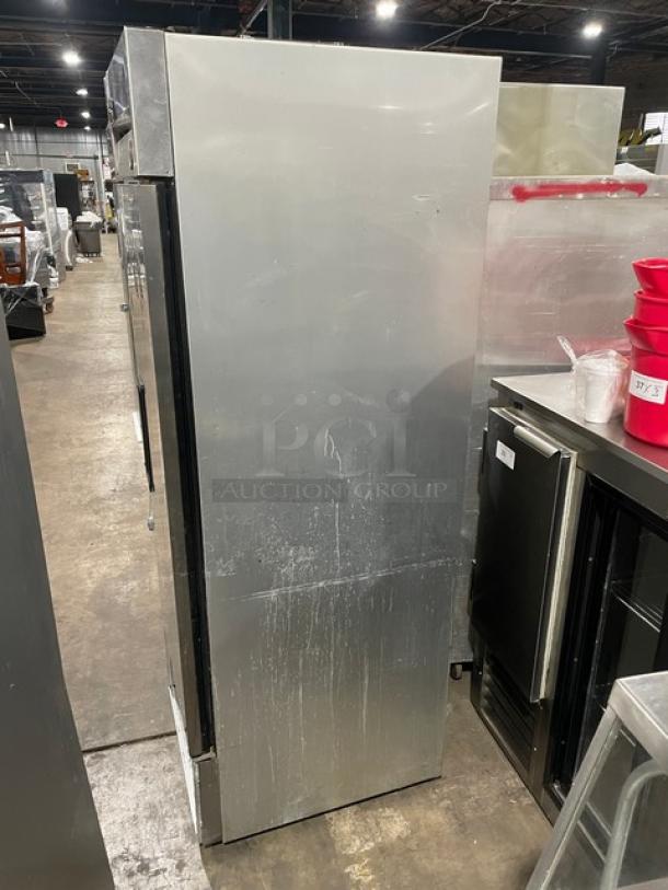 True One Door Reach-In Freezer, Model T23F, Serial 13209831, 115V 1 Phase. Good condition with visible wear on exterior.