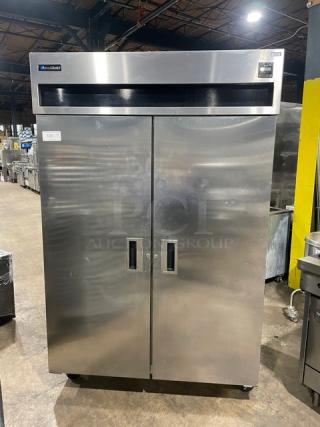 Delfield 6051-S reach-in cooler, 2 solid doors, stainless steel, 115V, 1 phase, on casters, serial 340703-T.