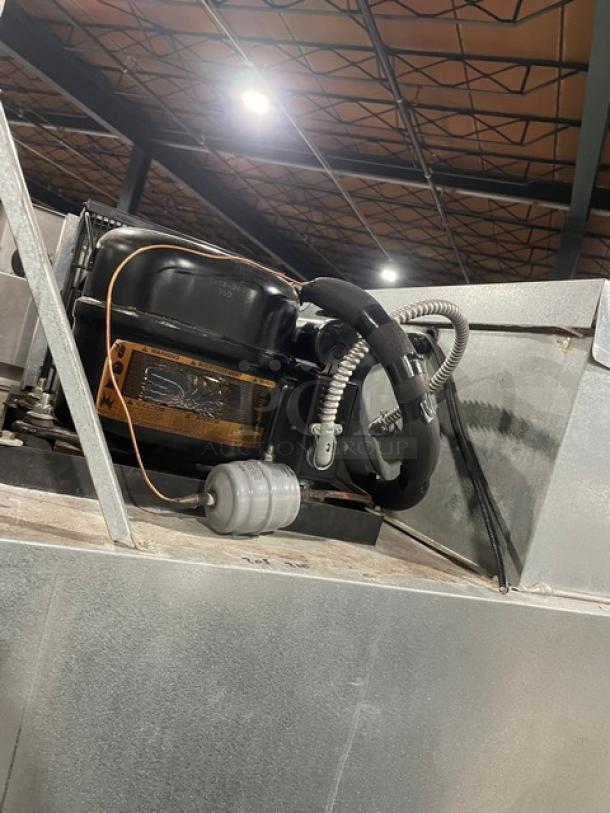 Delfield 6051-S reach-in cooler, 2 solid doors, on casters, model 6051-S, serial 340703-T, 115V 1 Phase.