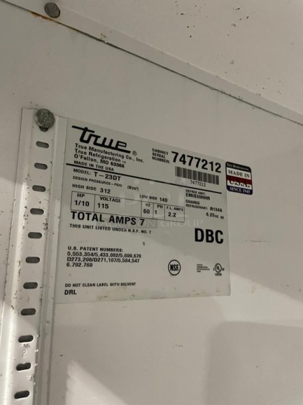 True Split Door Cooler/Freezer Combo, Model T23DT, Serial 7477212, 115V 1 Phase, on casters, label shows specs and NSF certification.