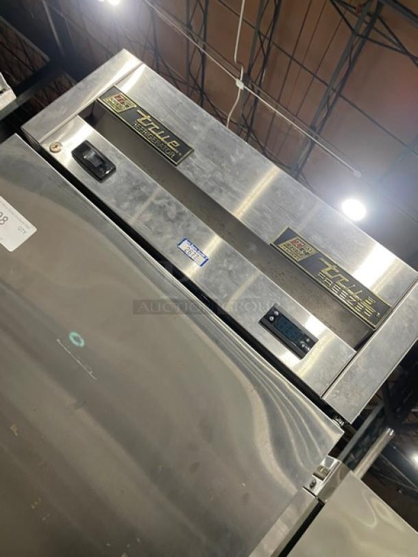 True T23DT split door cooler/freezer combo, stainless steel, on casters, model and serial number displayed, 115V 1 Phase.