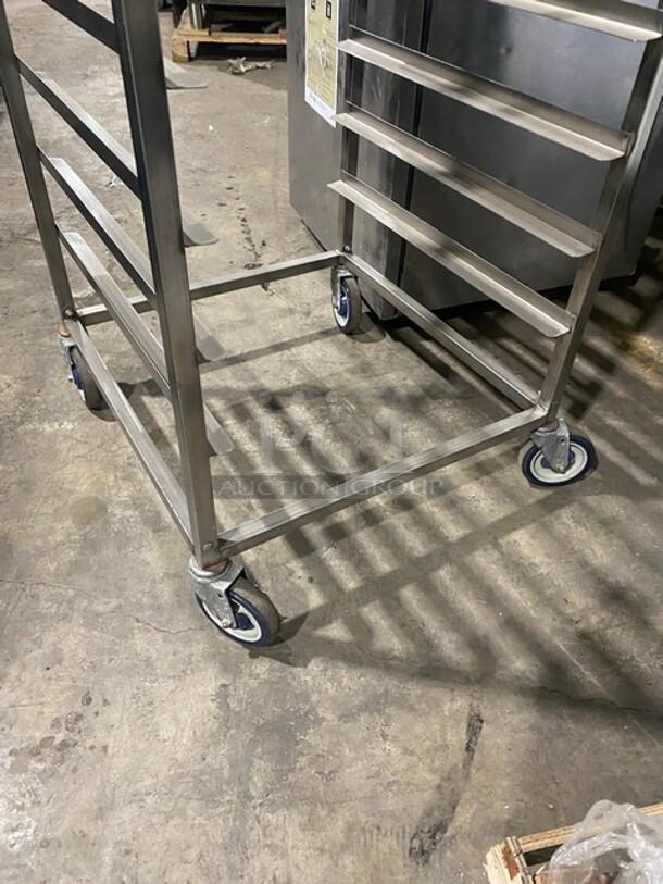 Channel commercial heavy-duty pan holding/transport rack on casters, stainless steel, good condition, sturdy construction.