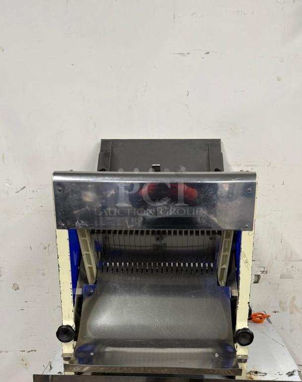 Omcan USA countertop bread slicer, model 302-5/18, 1/4 HP 110V; features stainless steel blades and durable construction.