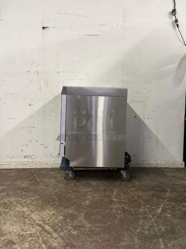 LABCONCO under counter dishwasher, stainless steel, on casters, used condition, visible surface wear.