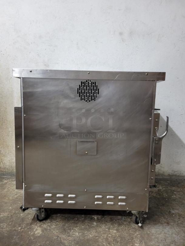 Winston CVap Cook and Hold HA4507 cabinet, stainless steel, under-counter, on wheels, minor surface wear visible.