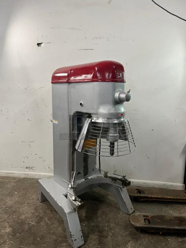 AXIS AX-M80 planetary mixer, silver and red, used condition. Features safety guard, sturdy legs for stability. Model labeled clearly.