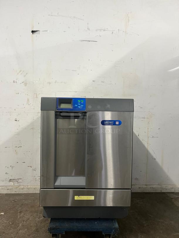 LABCONCO under counter dishwasher, stainless steel finish, digital control panel, excellent condition, brand logo visible.