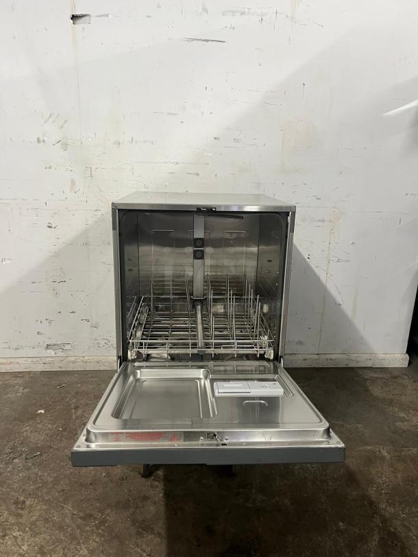 Labconco under-counter dishwasher, stainless steel, open door showing racks and compartments, used condition.