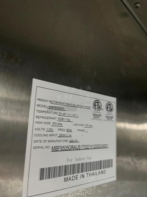 Atosa MBF8505GR refrigerator label showing model, specs, and "Made in Thailand." Stainless steel, 19.1 cu ft, ENERGY STAR®.