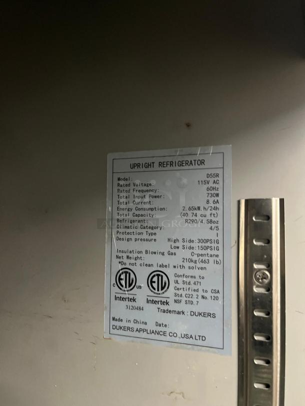 DUKERS D55R 55" reach-in refrigerator, 2-section, stainless steel. Label shows model, voltage, power, and certifications.