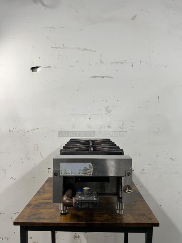 Imperial IHPA-2-12 12" gas countertop hotplate with two 32,000 BTU/hr burners, anti-clogging technology; used condition.