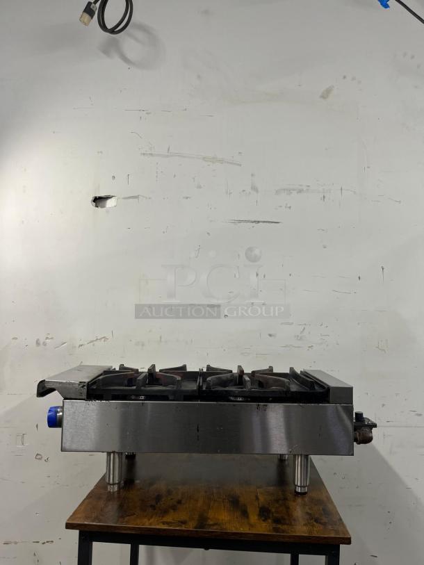 Imperial IHPA-2-12 gas hotplate, two 32,000 BTU cast iron burners, PyroCentric™ technology, stainless steel, used condition.