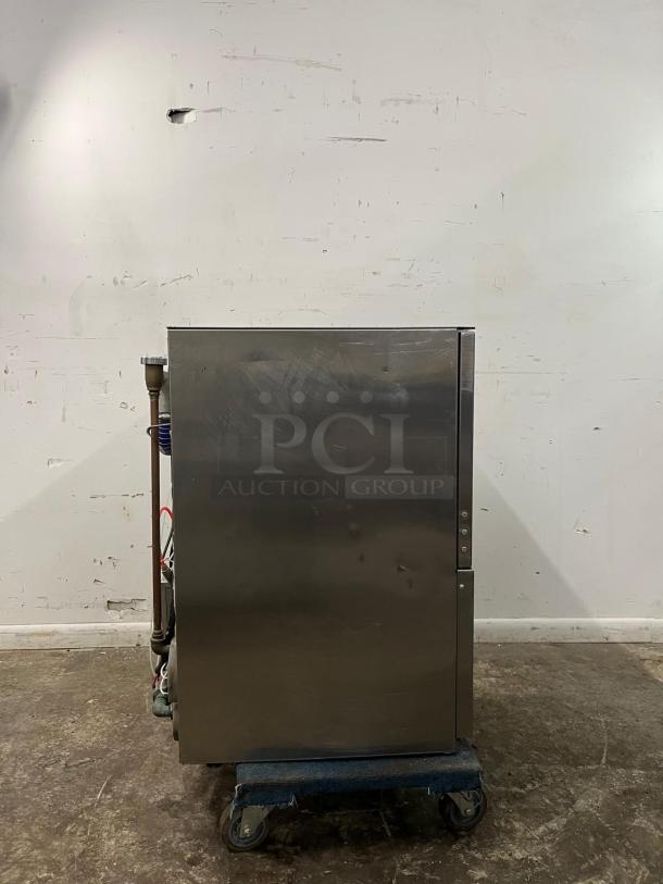 WAREFORCE UH30-E commercial dishwasher, stainless steel, energy-efficient, high-temperature model, side view on dolly.