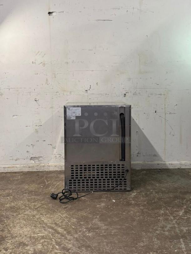 Follett Performance Plus undercounter refrigerator, model REV 4-ADA, right hinge, stainless steel finish, visible power cord, used condition.