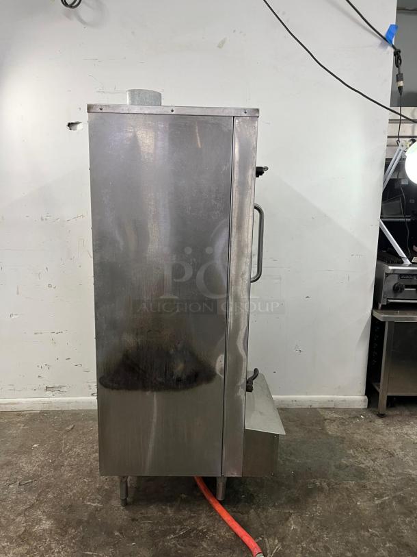 Town SM-24-R-STD natural gas smokehouse, 24" galvanized steel, right door hinges, 45,000 BTU, commercial-grade, used condition.