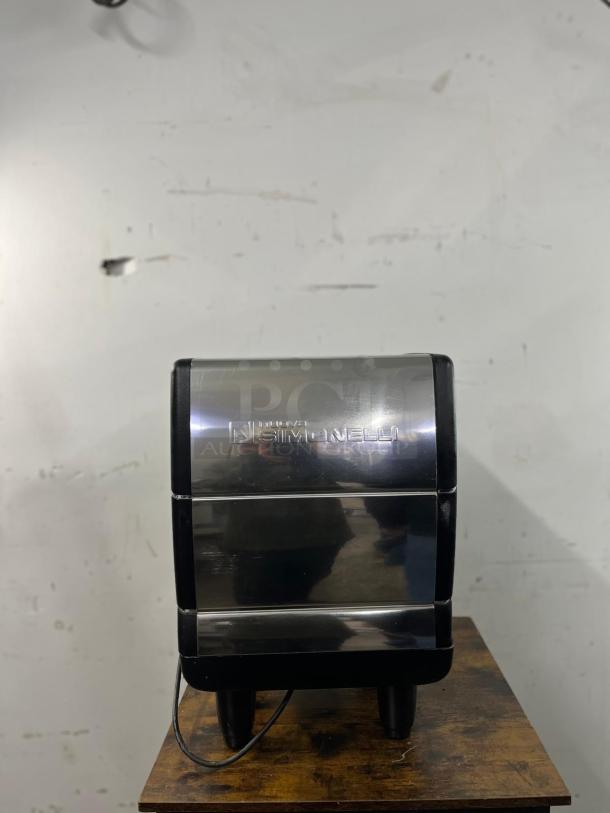 Nuova Simonelli Appia II espresso machine, commercial-grade, stainless steel finish, visible brand logo, reliable performance.