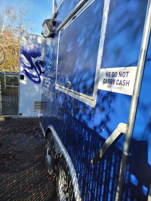 2020 16' Diamond Cargo Food Trailer with turnkey kitchen; blue exterior, "REEF KITCHENS" branding, and "WE DO NOT CARRY CASH" sign.