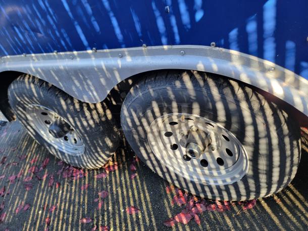 Dual axle wheels of a 2020 Diamond Cargo Food Trailer, showcasing sturdy construction and reliable performance.