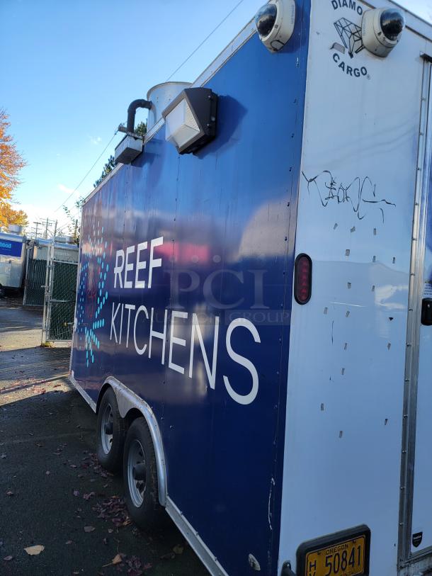 2020 16' Diamond Cargo food trailer with turnkey kitchen, featuring commercial refrigeration, Wells cooking surface, and Mitsubishi A/C.