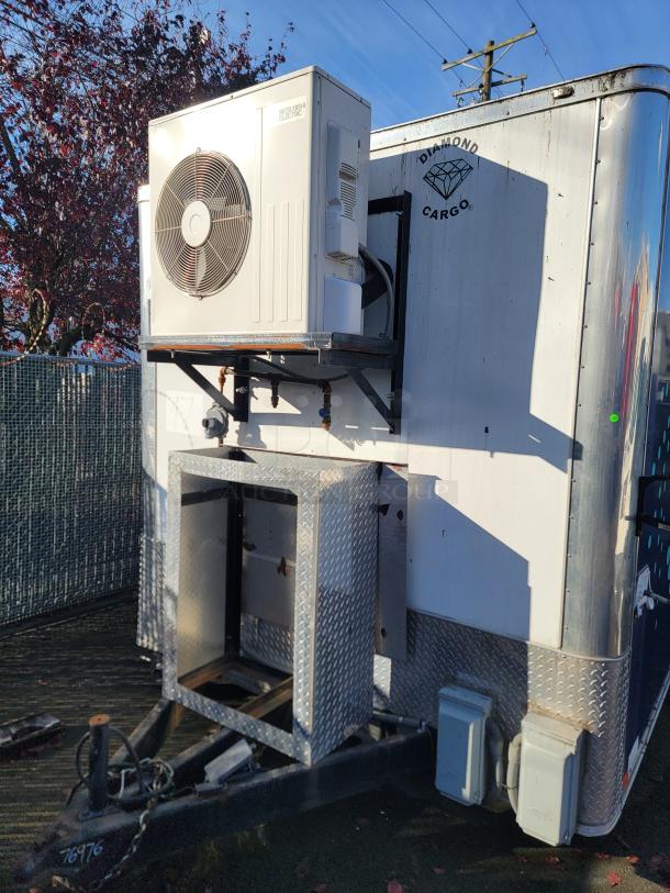 2020 Diamond Cargo 16' food trailer with Mitsubishi A/C, robust 9990 LB GVWR. Features Diamond Cargo logo.