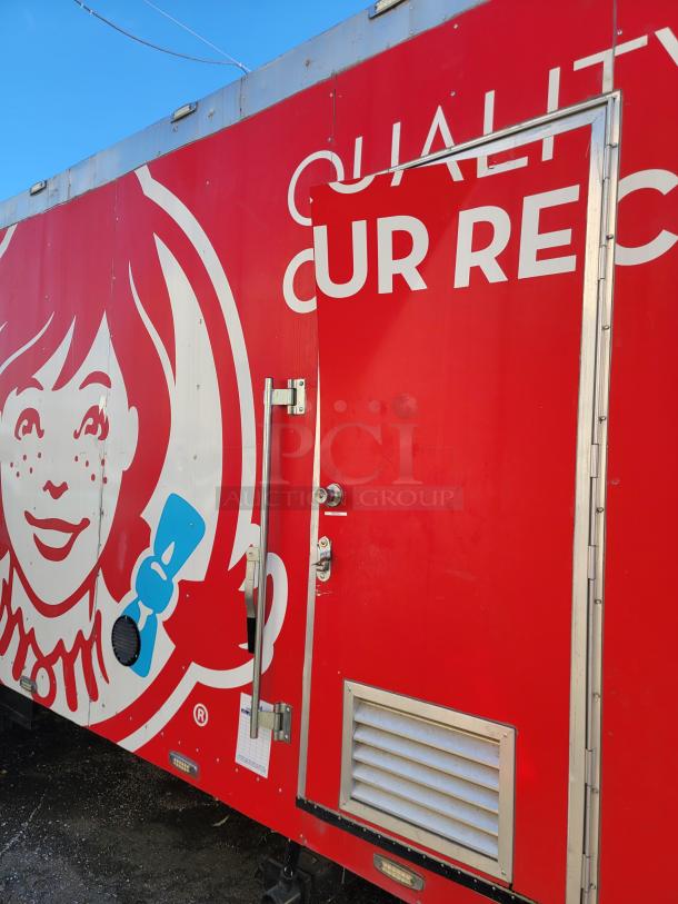 2021 Texino 28' Food Trailer with red branding. Features heavy-duty exhaust, premium appliances, and two commercial fridges.