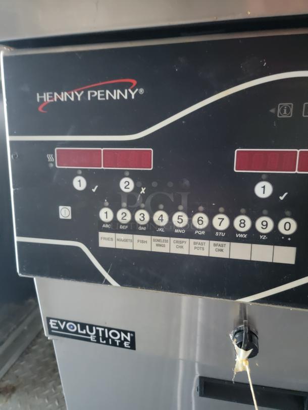 Henny Penny Evolution Elite fryer control panel in Texino food trailer, displaying options for fries, nuggets, fish, and more.