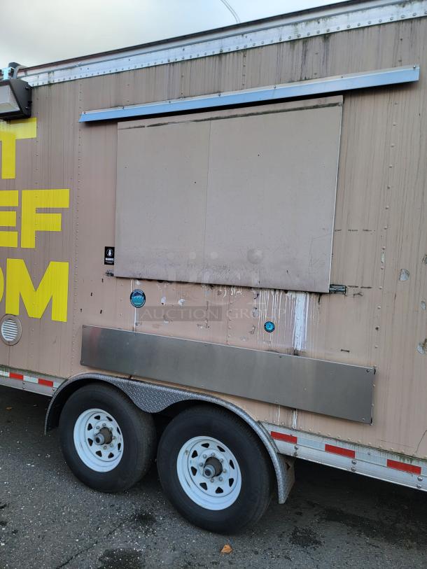 24' Quality food trailer, stainless steel, Turbo Air refrigeration, NSF-certified. Ready for mobile culinary business.
