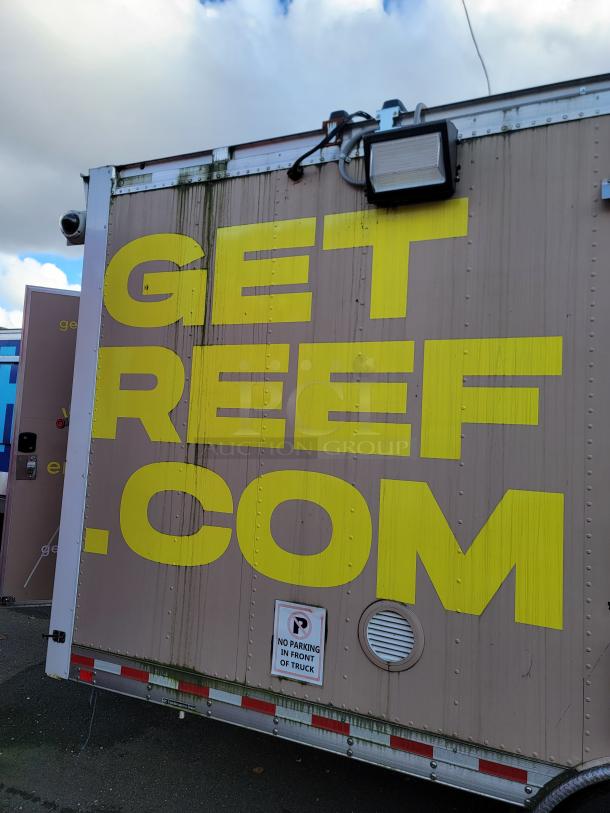 24' Quality food trailer exterior with GETREEF.COM lettering. Durable construction, ready for high-volume service.