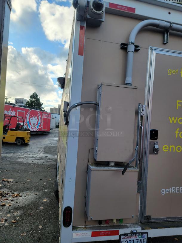 Professional 24' Quality food trailer with stainless steel construction, Turbo Air refrigeration, NSF-certified equipment.