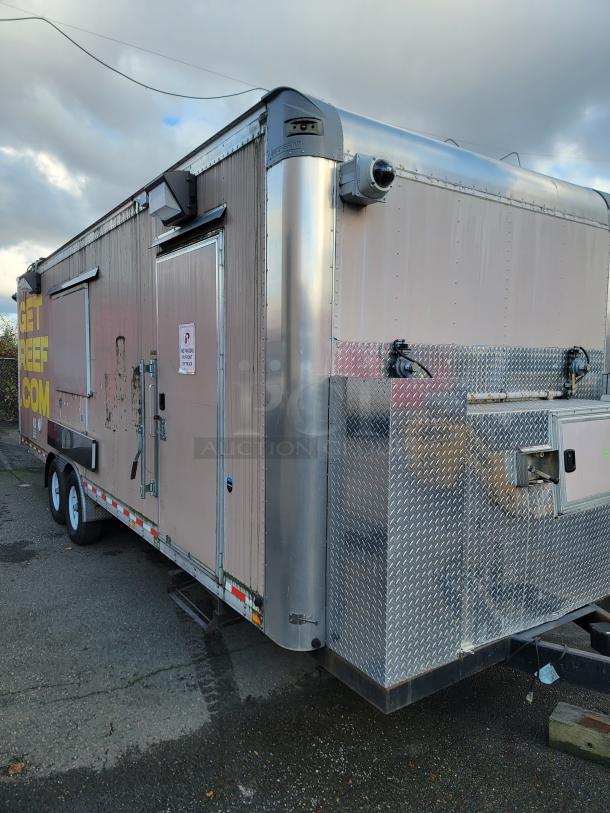 Quality 24' food trailer with stainless steel construction, Turbo Air refrigeration, NSF-certified equipment, ready for use.