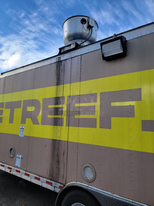 24-foot Quality food trailer with stainless steel construction and Turbo Air refrigeration, perfect for mobile culinary business.