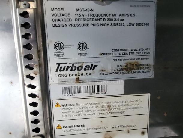 Label showing Turbo Air refrigeration model MST-48-N, voltage 115V, frequency 60Hz, refrigerant R-290, and safety certifications.