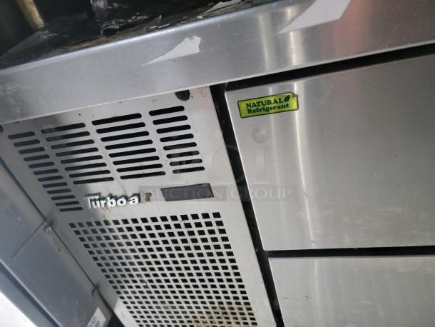 Turbo Air refrigeration unit inside a 24-foot Quality food trailer, featuring durable stainless steel construction.