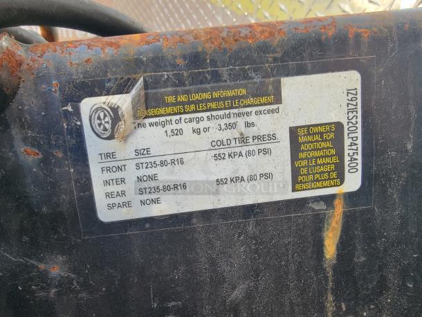 Label on a 2020 24' Quality food trailer, detailing tire and loading information. Shows tire sizes and pressure.