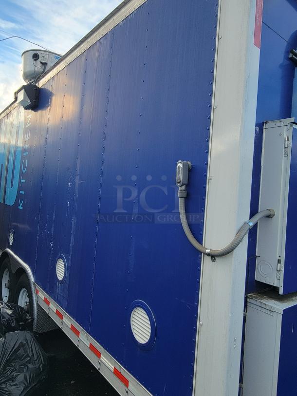 2020 Quality 24' food trailer, blue exterior, dual axles, power hookups, maintained condition, ready for business.